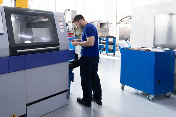 Machine operator tuning machine